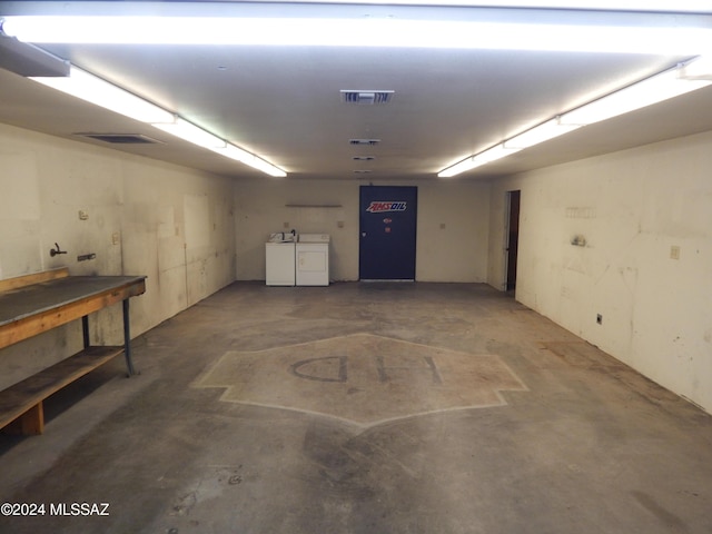 garage with washer and dryer