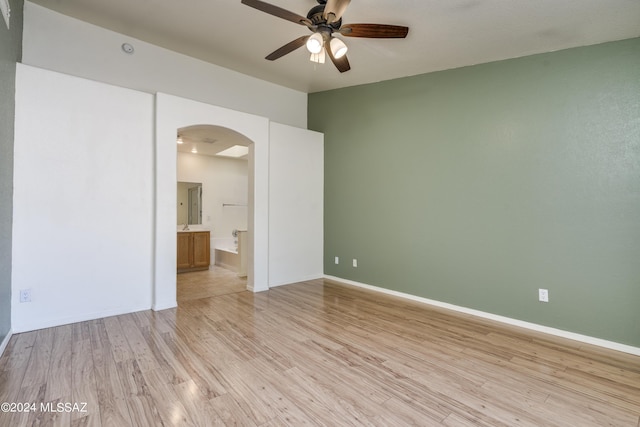 unfurnished room with light hardwood / wood-style flooring and ceiling fan