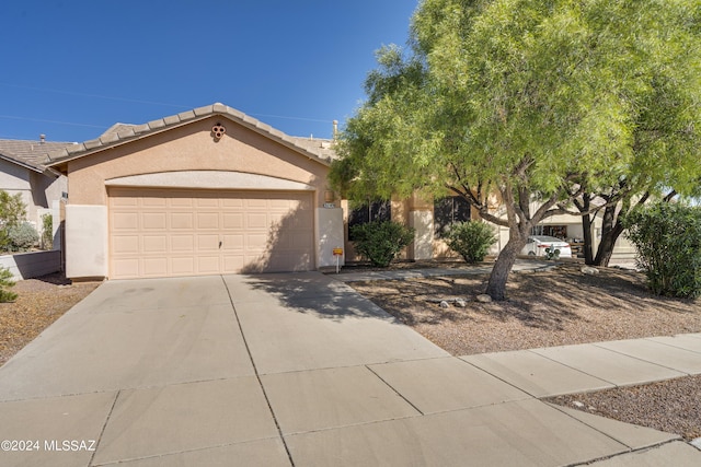 view of front of property featuring a garage