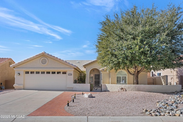 view of front of property featuring a garage