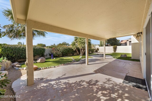 view of yard featuring a patio area and fence