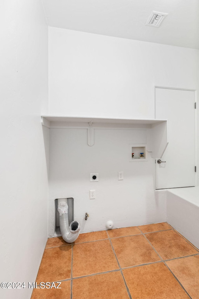 laundry area featuring tile patterned flooring, hookup for a washing machine, and gas dryer hookup