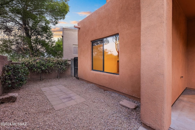 view of property exterior at dusk