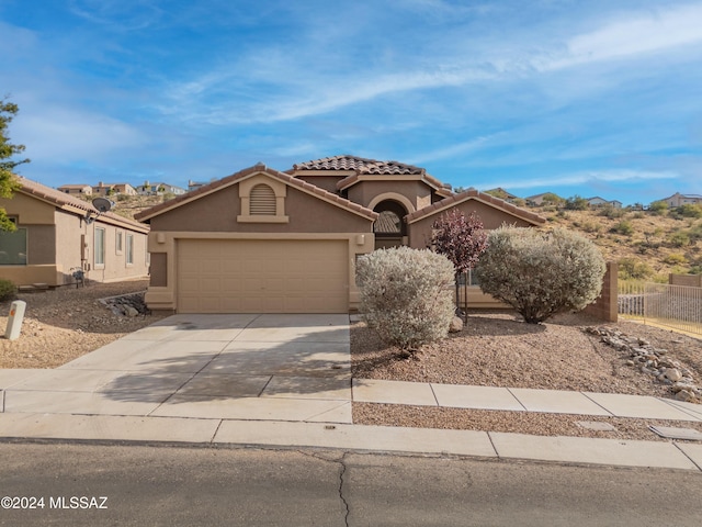 view of front of home featuring a garage