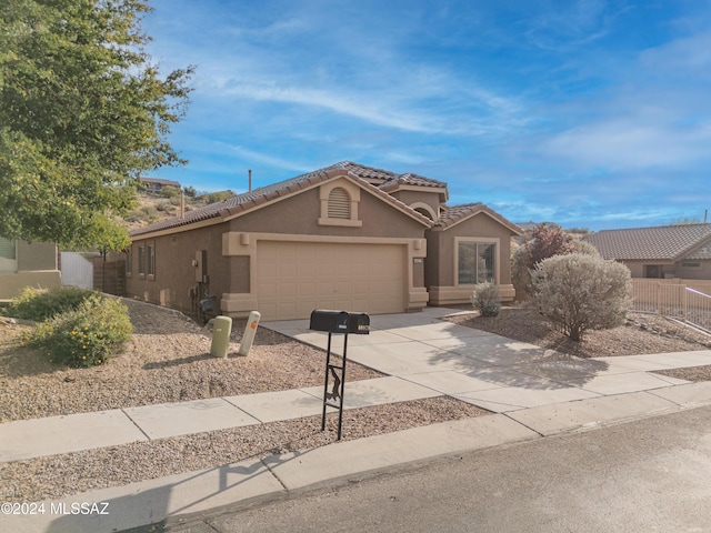 view of front of home featuring a garage