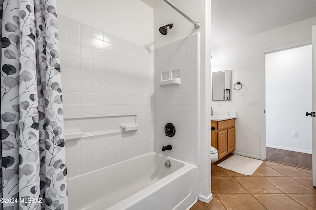 full bathroom with tile patterned floors, vanity, shower / bath combination with curtain, and toilet