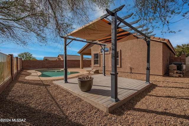 exterior space with a fenced in pool