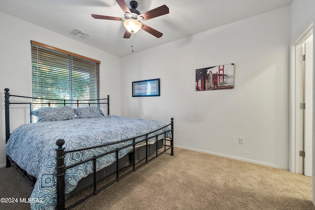 bedroom featuring ceiling fan and carpet floors