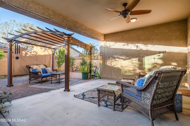 view of patio featuring a pergola, an outdoor living space, and ceiling fan