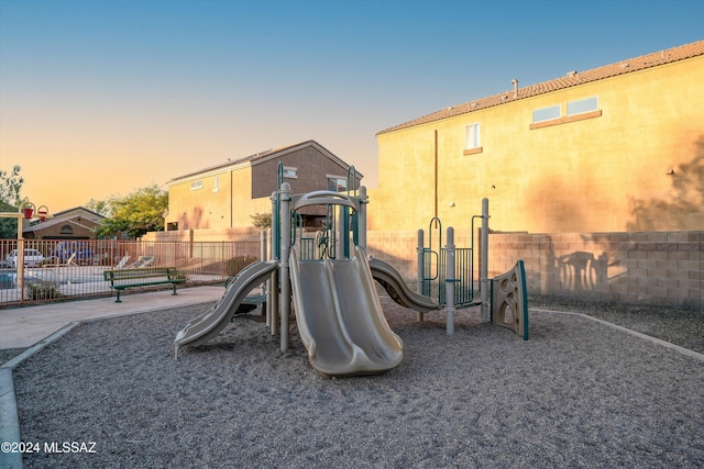 view of playground at dusk