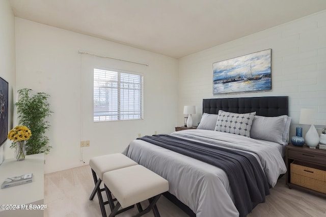 bedroom with light hardwood / wood-style floors