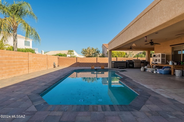 view of pool featuring a patio and ceiling fan