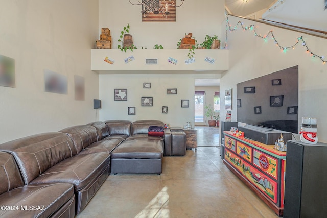 living room featuring a high ceiling