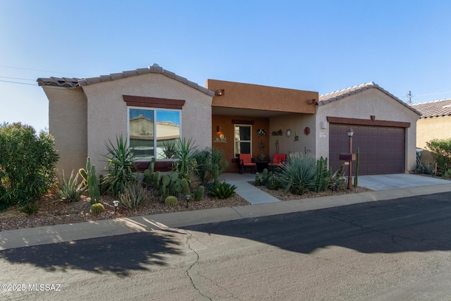 view of front of property featuring a garage