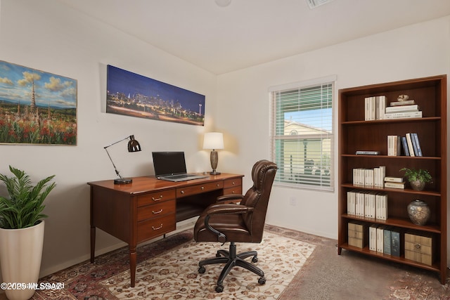 view of carpeted home office