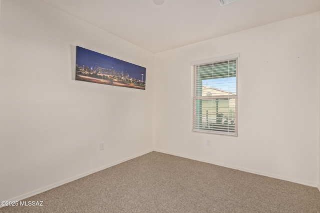 empty room featuring carpet floors