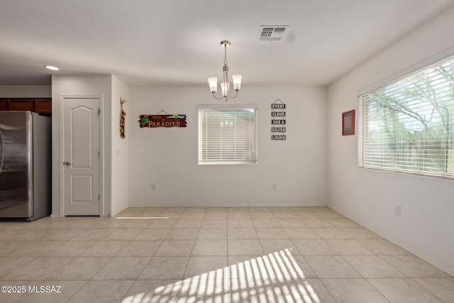 interior space featuring a chandelier