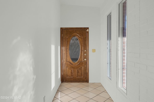 foyer entrance featuring light tile patterned floors