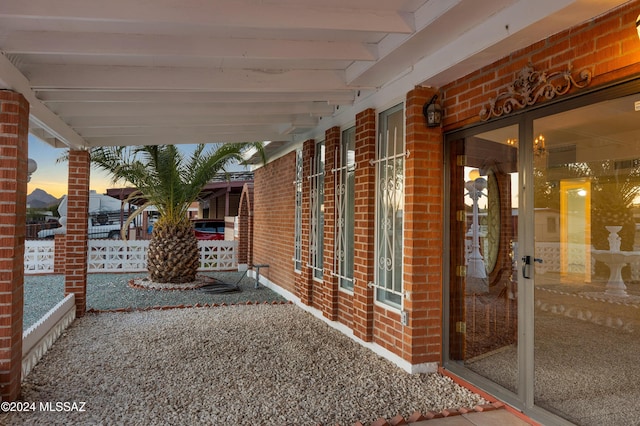 view of patio terrace at dusk