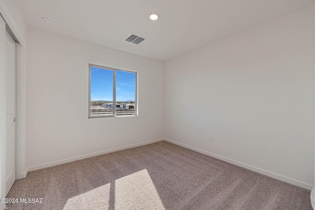 empty room with carpet floors