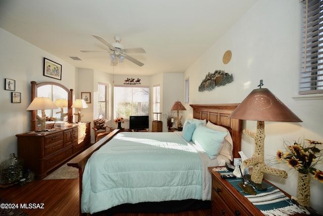 bedroom featuring dark hardwood / wood-style floors and ceiling fan