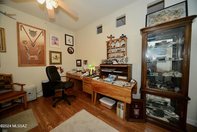 office area with ceiling fan and hardwood / wood-style floors