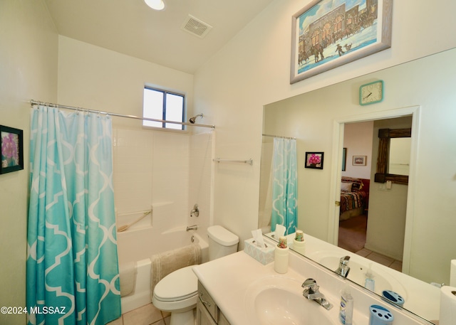 full bathroom with toilet, shower / tub combo with curtain, vanity, and tile patterned flooring