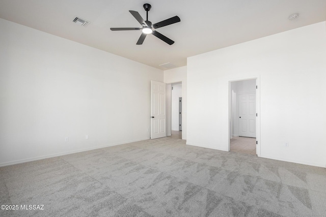 unfurnished bedroom featuring ceiling fan and light colored carpet