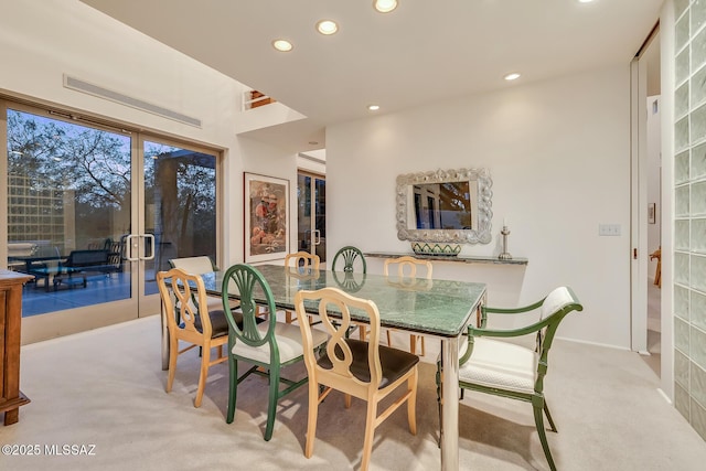 view of carpeted dining space