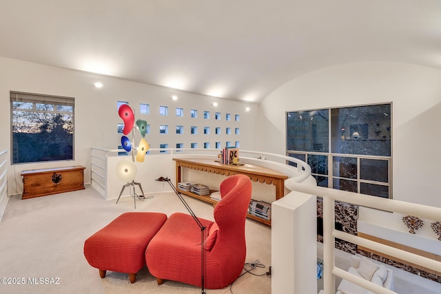 living room featuring brick ceiling, carpet, and lofted ceiling