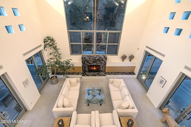 living room with a high ceiling