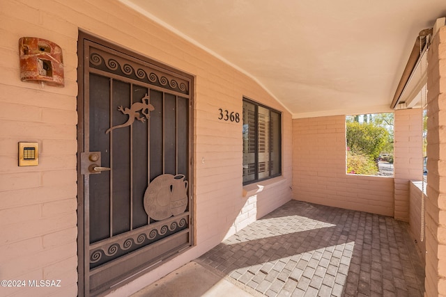 entrance to property with a porch