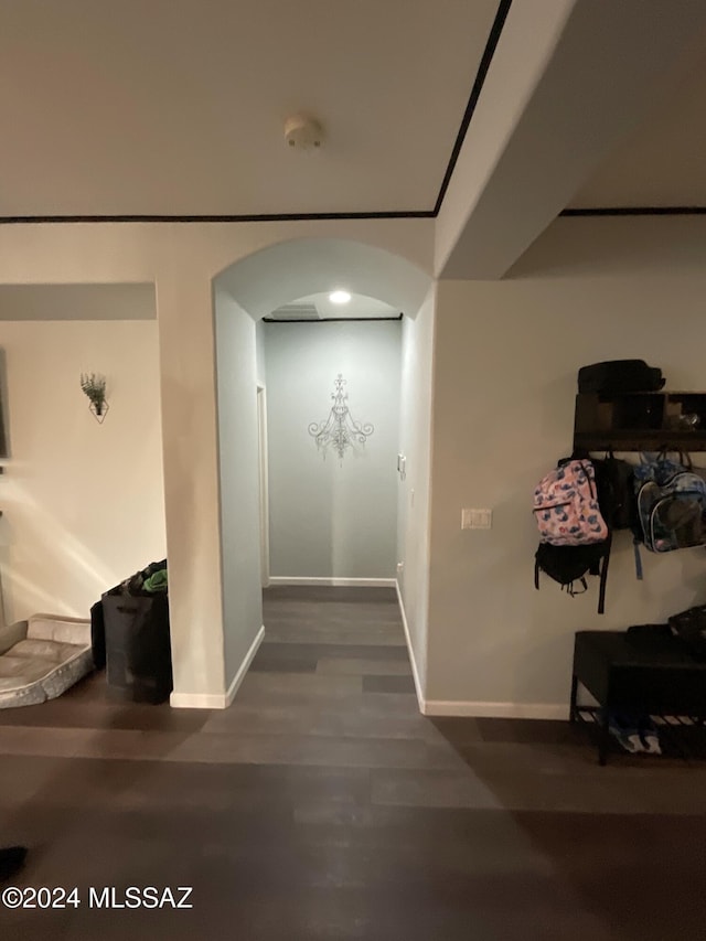 corridor featuring dark hardwood / wood-style flooring