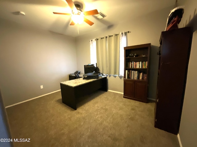 office with light colored carpet and ceiling fan