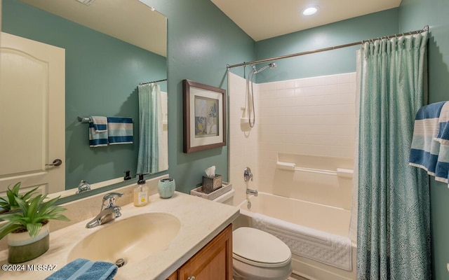 full bathroom featuring vanity, toilet, and shower / tub combo with curtain