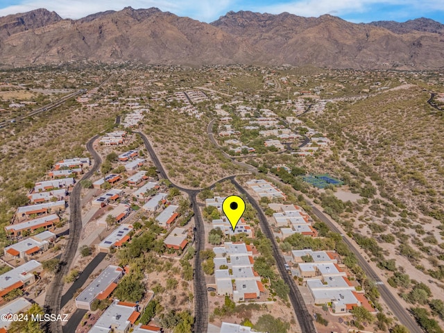 birds eye view of property featuring a mountain view