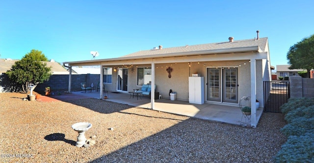 rear view of house with a patio area