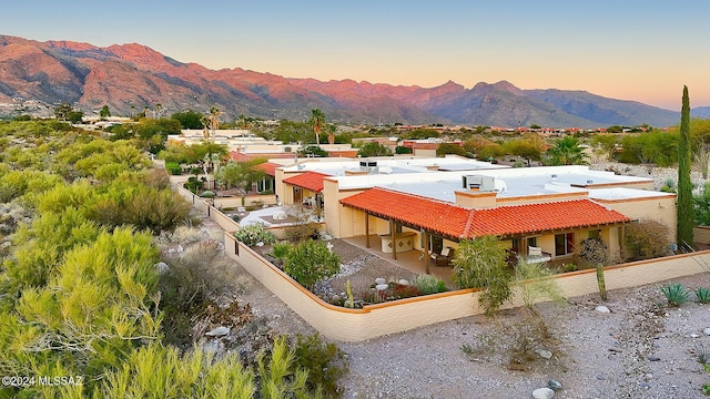 aerial view at dusk with a mountain view