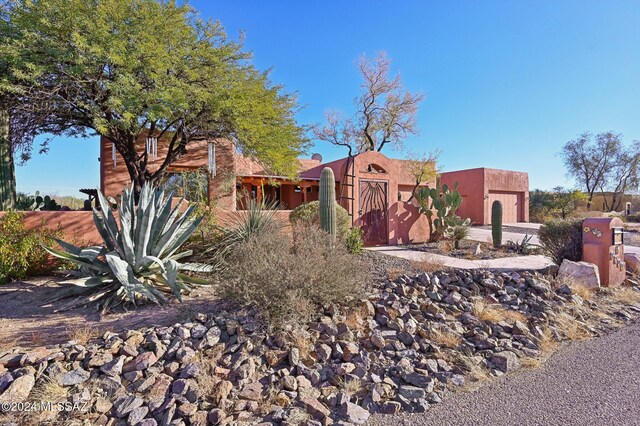 view of adobe home