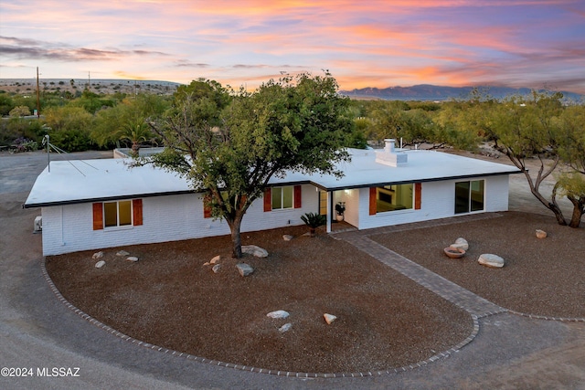 view of front of property featuring a patio