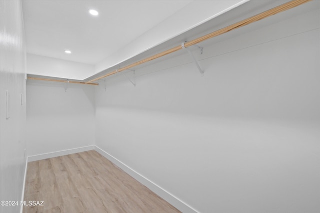 walk in closet featuring light wood-type flooring