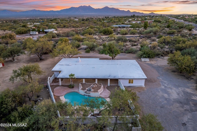 aerial view at dusk with a mountain view