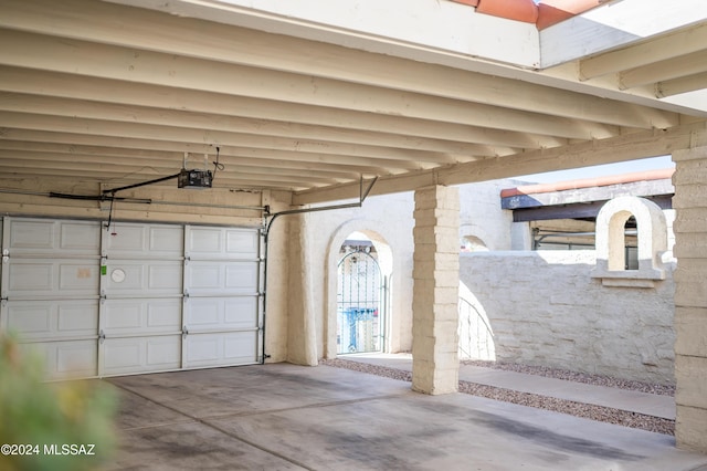 garage featuring a garage door opener