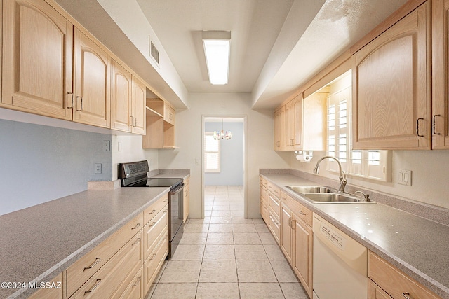 kitchen featuring white dishwasher, sink, light brown cabinets, light tile patterned floors, and black range with electric stovetop