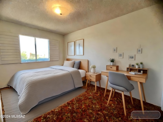 bedroom with a textured ceiling