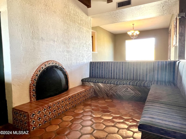 living area featuring an inviting chandelier