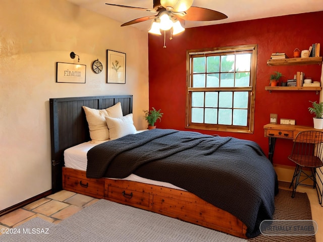 bedroom featuring ceiling fan