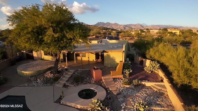 exterior space featuring a mountain view