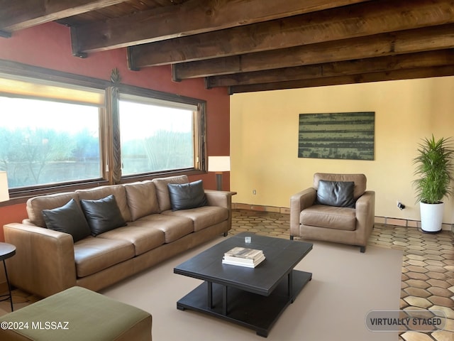 living room featuring beam ceiling and wood ceiling