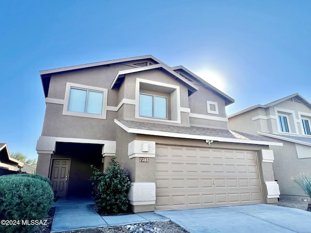 view of front of property with a garage